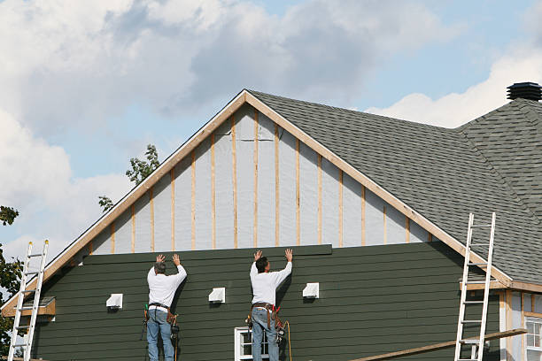 Professional Siding technician working in Milton, NC